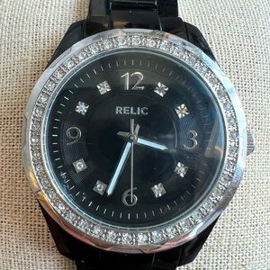 Relic large face watch with black plastic band and cubic zirconia